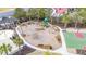 Aerial view of playground with modern equipment and a basketball court in a Gathering-friendly community at 1971 N North Creek Dr, Mount Pleasant, SC 29466