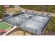 Aerial view of fenced tennis and basketball courts with shade structure in an amenity-rich community at 1971 N North Creek Dr, Mount Pleasant, SC 29466