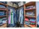 Well-organized walk-in closet featuring built-in shelves, hanging rods, and drawers to maximize storage space at 1971 N North Creek Dr, Mount Pleasant, SC 29466