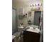 Bathroom featuring a vanity with a sink, toilet and shower with matching accessories at 207 Short Woods Ct, Summerville, SC 29486