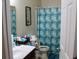 Functional bathroom with a vanity, toilet, and shower with a curtain at 207 Short Woods Ct, Summerville, SC 29486
