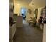 Hallway decorated with chairs, mirror, and decor leading to the living area at 207 Short Woods Ct, Summerville, SC 29486