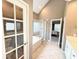 Bright bathroom featuring a soaking tub, separate shower, ensuite access, and natural light at 213 Ashmont Dr, Wando, SC 29492