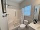 Bathroom featuring a walk-in shower, toilet, vanity with sink and a window with natural light at 213 Ashmont Dr, Wando, SC 29492