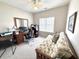 This versatile bedroom features a desk and convertible sofa, perfect for work and relaxation at 213 Ashmont Dr, Wando, SC 29492