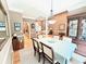 Dining room with hardwood floors that opens to the living room at 213 Ashmont Dr, Wando, SC 29492