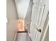 Hallway with carpeted stairs, railing, and neutral colored walls at 213 Ashmont Dr, Wando, SC 29492