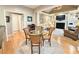 Eat-in kitchen with open floor plan to living room and access to other parts of the house at 213 Ashmont Dr, Wando, SC 29492