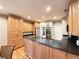 Spacious kitchen features a central island with bar seating and ample cabinet storage at 213 Ashmont Dr, Wando, SC 29492