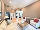 Bright living room with hardwood floors, soaring ceilings and an open floor plan at 213 Ashmont Dr, Wando, SC 29492