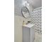 Stylish bathroom featuring modern vanity with decorative mirror and patterned shower curtain at 2215 Suffolk St, North Charleston, SC 29405