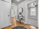 Inviting entryway with hardwood floors, modern decor, and seamless transition to other living spaces at 2215 Suffolk St, North Charleston, SC 29405