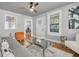 Inviting living room boasting hardwood floors, modern decor, and lots of natural light at 2215 Suffolk St, North Charleston, SC 29405
