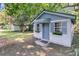 Charming outbuilding with flower boxes, adding character and functionality to the property at 2215 Suffolk St, North Charleston, SC 29405