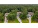 Aerial view of homes surrounded by dense trees at 233 Camber Rd, Huger, SC 29450
