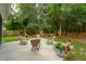 Outdoor living area with seating and a fire pit provides a relaxing backyard retreat at 233 Camber Rd, Huger, SC 29450