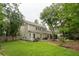 Beautiful backyard with a lush lawn and mature trees, enhancing the property's appeal at 233 Camber Rd, Huger, SC 29450