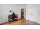 Bright office features hardwood floors, and a view to another room at 233 Camber Rd, Huger, SC 29450