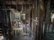 Stripped interior showing wood beams, exposed framing, studs, wood floors, and room layout at 2334 Kent Ave, North Charleston, SC 29405
