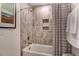 Modern bathroom with tiled shower, shower niche, and shower curtain at 265 Huguenot Trl, Huger, SC 29450