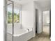 This bathroom features a tub and shower combination, with light wood-look flooring at 3013 Argyll Dr, Summerville, SC 29483