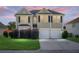 Charming two-story home with a well-maintained lawn, a two-car garage, and neatly trimmed bushes in the front yard at 3013 Argyll Dr, Summerville, SC 29483