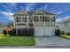 Charming two-story home with a well-maintained lawn, a two-car garage, and neatly trimmed bushes in the front yard at 3013 Argyll Dr, Summerville, SC 29483