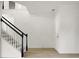 Foyer with staircase featuring black banisters, white spindles, light wood floors and lots of natural light at 3013 Argyll Dr, Summerville, SC 29483