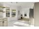 Bright kitchen features lots of light from many windows, marble floors, and stainless steel appliances at 3013 Argyll Dr, Summerville, SC 29483