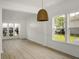 Open living room with large windows offering a scenic view and bright light at 3013 Argyll Dr, Summerville, SC 29483