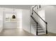Open living space with staircase and view to dining and kitchen at 3013 Argyll Dr, Summerville, SC 29483