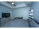 Bedroom featuring a tray ceiling with fan, light blue walls, and carpeted floors at 309 Hathaway Dr, Goose Creek, SC 29445