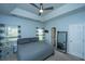 Comfortable bedroom with a ceiling fan, grey walls, and natural light from the window at 309 Hathaway Dr, Goose Creek, SC 29445