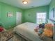 Green bedroom featuring a comfortable bed, natural light, and positive vibes at 309 Hathaway Dr, Goose Creek, SC 29445