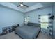 Serene main bedroom features a tray ceiling, soft lighting, neutral walls, and is carpeted at 309 Hathaway Dr, Goose Creek, SC 29445