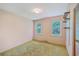 Bedroom featuring large windows and green carpet at 312 Woodward Blvd, Summerville, SC 29483