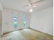 Bedroom featuring a ceiling fan and two bright windows at 312 Woodward Blvd, Summerville, SC 29483