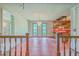 Dining space with brick floor, wallpaper, ample natural light, and seamless access to the adjacent kitchen at 312 Woodward Blvd, Summerville, SC 29483