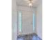 Welcoming entryway with neutral walls, a white door with decorative glass, and colorful slate-style floors at 312 Woodward Blvd, Summerville, SC 29483