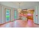 Eat-in kitchen with unique brick floor, bright wallpaper, and custom lighting at 312 Woodward Blvd, Summerville, SC 29483