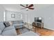Inviting living room featuring a comfortable gray sectional sofa, hardwood floors, and a ceiling fan at 340 Stefan Dr, Charleston, SC 29412