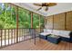 Inviting screened porch with comfortable seating and lovely outdoor views at 340 Stefan Dr, Charleston, SC 29412
