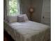 This charming bedroom offers hardwood floors, soft lighting, neutral decor and a cozy atmosphere at 3646 Hilton Dr, Johns Island, SC 29455