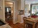 Open concept kitchen with dining area and living room, cabinets, granite countertops and hardwood floors at 3646 Hilton Dr, Johns Island, SC 29455