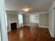 Bright living room features refinished wood floors and fireplace at 3646 Hilton Dr, Johns Island, SC 29455