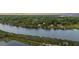 Beautiful aerial view of homes on waterway surrounded by lush green trees at 4940 Lambs Rd, North Charleston, SC 29418