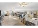 Unfinished attic space with hardwood floors, multiple skylights, and a ceiling fan at 4940 Lambs Rd, North Charleston, SC 29418