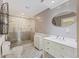 A modern bathroom features a glass shower, white marble vanity, and a modern toilet at 4940 Lambs Rd, North Charleston, SC 29418