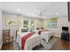 Cozy bedroom featuring two twin beds, nautical decor, and hardwood floors at 4940 Lambs Rd, North Charleston, SC 29418