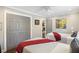 This bedroom features hardwood floors, gray walls and trim, and two twin beds at 4940 Lambs Rd, North Charleston, SC 29418